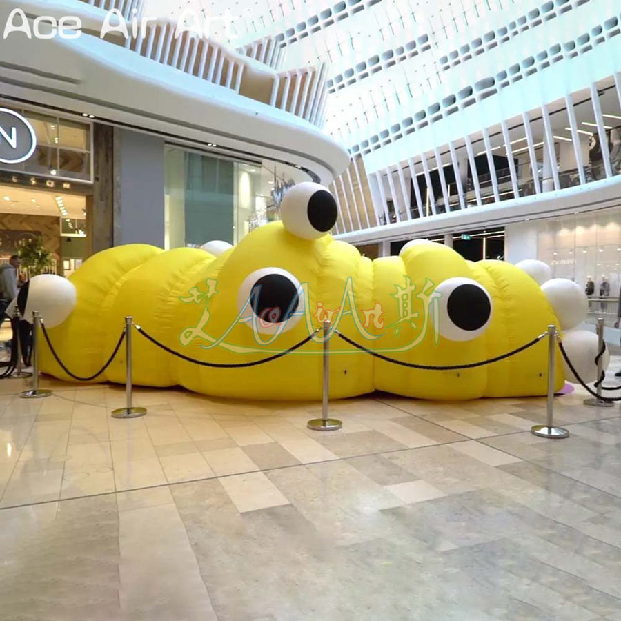 Yellow Inflatable Caterpillar Tunnel Tent Children's Entertainment Curved Marquee with 2 Entrance and Many Eyes for Mall Display